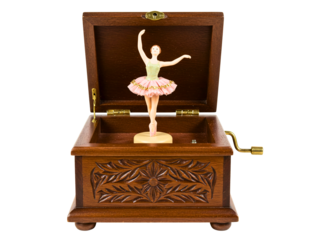 Ornate wooden music box with a spinning ballerina dancer isolated on transparent background