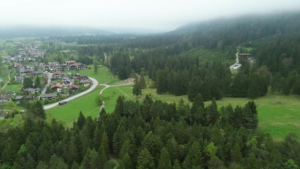 Obraz premium Green meadows and colorful houses
