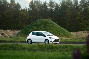 Energy efficient SUV traveling through rural area