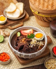 Rawon is a typical Indonesian dish originating from Ponorogo, East Java, which is a black meat soup with a mixture of special spices using kluwek.