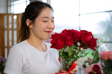 Young entrepreneurs are working at florist shop.