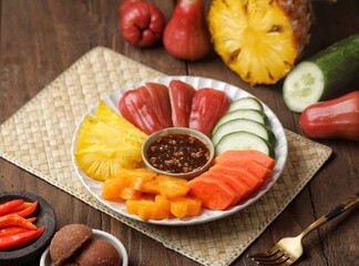 Rujak buah. Fruit Rujak or Indonesian fruit salad is a fresh fruit dish enjoyed with addictive peanut sauce.