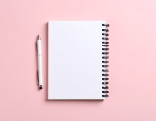 Clean spiral notebook with pen on plain background