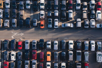 Symmetrical Aerial View of Cars in Parking