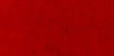 Fototapeta premium Abstract high-resolution red wall texture design with a slightly distressed and weathered surface. The wall features peeling paint, subtle cracks, rough plaster, and a gritty tactile feel.