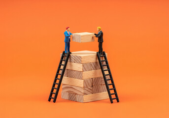 Miniature businessman Building the Future