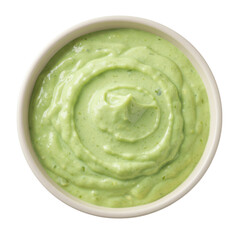 Obraz premium Creamy green dip served in a bowl, showcasing a smooth texture, ideal for appetizers