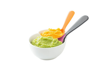Colorful baby food puree in a white bowl with spoons ready for feeding during mealtime preparation