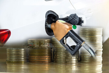 Transportation and ownership concept - man pumping gasoline fuel in car at gas station. hight price during war Russia and  Ukraine Israel Iran Hamas concept.