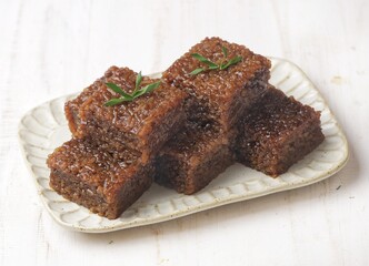 Wajik is a traditional Javanese wedding dish made from sticky rice, coconut milk and brown sugar.