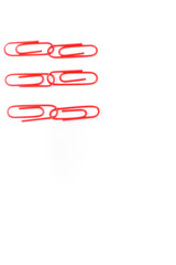Linked Red Paper Clips on White Background - A Minimalist Office Supply Arrangement