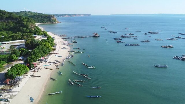 Aerial View of Coastal Village with Fishing Boats and Beach Ekas Lombok, Indonesia