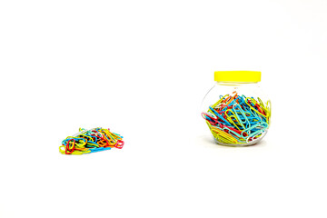 Vibrant Array of Colored Paper Clips: An Essential Stationary Item on White Background
