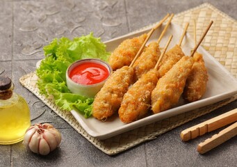 Sempol Ayam is a type of fried food made from tapioca flour.