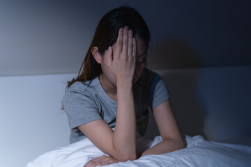 Sad worried and stressed, depressed asian young woman, girl suffering in bed from insomnia problem,...