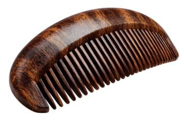 Close up of a natural wood comb with fine teeth for hair styling isolated on transparent background