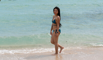 Pretty Thai Girl in Bikini on Beach