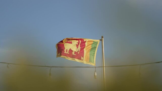 A flag os Sri lanka flying in the wind