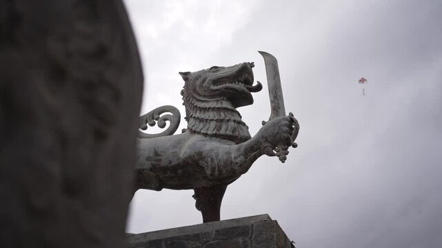 A reveal of a staute of the Sri Lankan lion placed on the beach in Colombo
