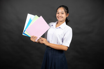 An Asian high school girl enters an international competition to showcase her talent, with the goal...