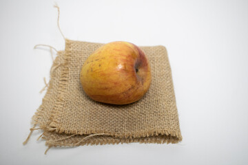 Fresh and simple apples on burlap