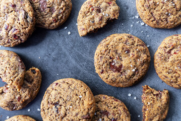 Perilla seeds chocolate chunk cookies on grey background.