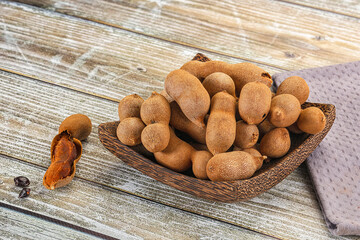 Tropical exotic Tamarind fruit heap
