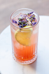 Refreshing summer lemonade with orange and lemon slices