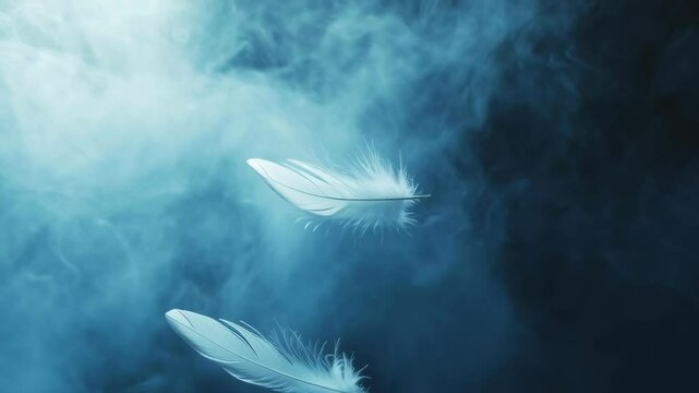 Two white feathers floating in the air above a cloudy blue sky. Concept of freedom and lightness, as the feathers seem to be weightless and effortlessly floating through the air