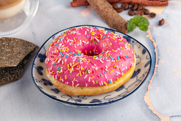 Sweet donut with strawberry icing
