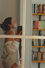 autorretrato en la ventana