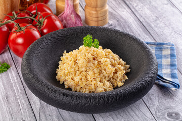 Vegan cuisine - boiled bulgur garnish