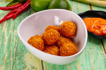 Fried crispy yellow cheese balls