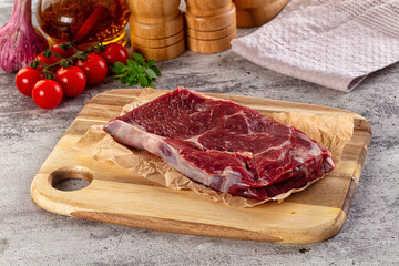Gourmet raw rib eye steak