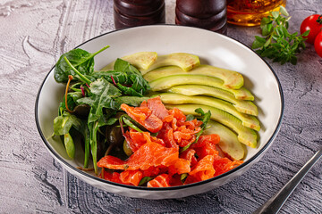 Dietary salad with salmon and avocado