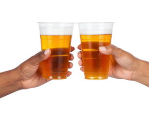 Two hands holding plastic cups filled with amber-colored beer, raised as if toasting.