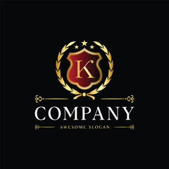 Luxury Royal Crest Logo with Letter K in Golden Shield and Laurel Wreath on Black Background