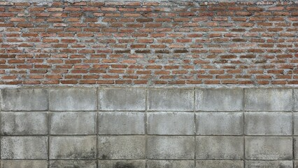 Fence made of orange brick and grey square brick blocks. Old wall has stains and cracks. Old brick...