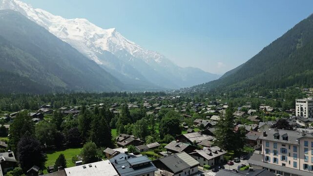 Aerial Tilt Up Of Chamonix Village  and French Alps During Summer