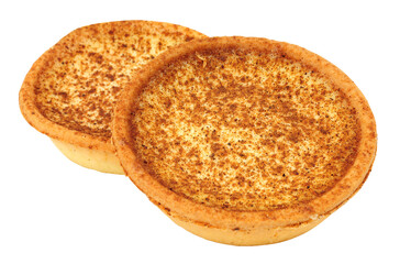 Egg custard tart with all butter pastry filled with egg custard filling and topped with nutmeg isolated on a white background