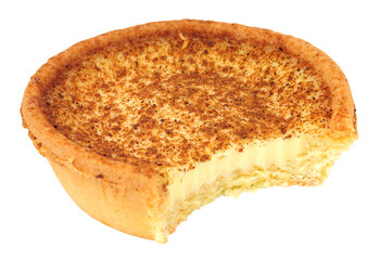 Egg custard tart with all butter pastry filled with egg custard filling and topped with nutmeg isolated on a white background