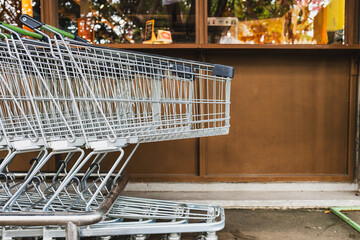 Close up Shopping cart at the supermarket. Black friday and Shopping  concept