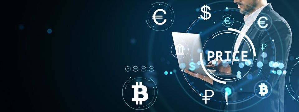 Businessman analyzing currency price data on laptop with digital forex and cryptocurrency icons in holographic interface on dark background.