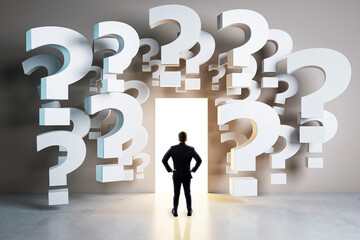 Businessman standing in front of glowing door surrounded by floating question marks symbolizing decision-making and future opportunities in business.