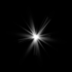 Obraz premium Bright white starburst light flare effect isolated on black background