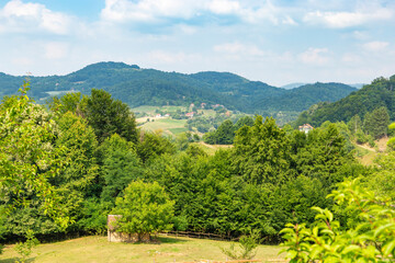 Summer landscape with mountains and fields in western Serbia