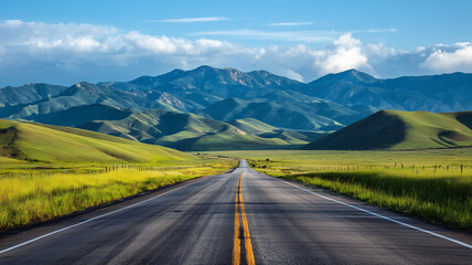 Naklejka premium Highway cutting through lush green grass