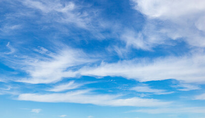 Blue sky and white clouds. Natural background.
