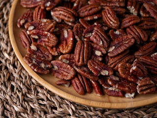 raw organic pecan nuts pattern background.