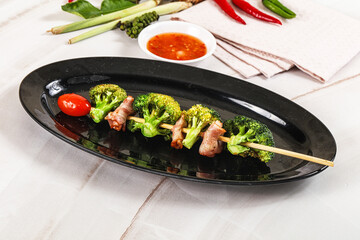 Thai Street foof satay with bacon and broccoli